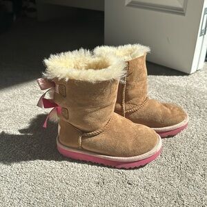 Ugg Bailey now II size 9 gently used tan and pink and toddler Ugg